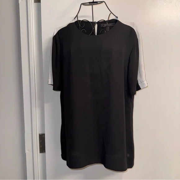 BCBGMaxAzria Black Cutout Back Short Sleeve Blouse - Picture 3 of 9